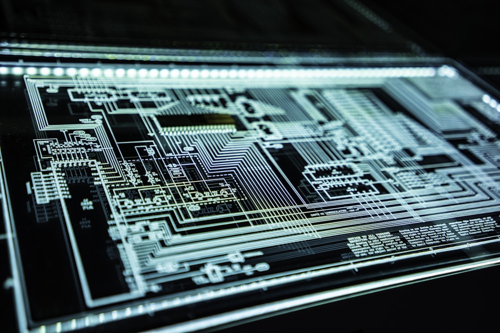 Light trails across a teal circuit board