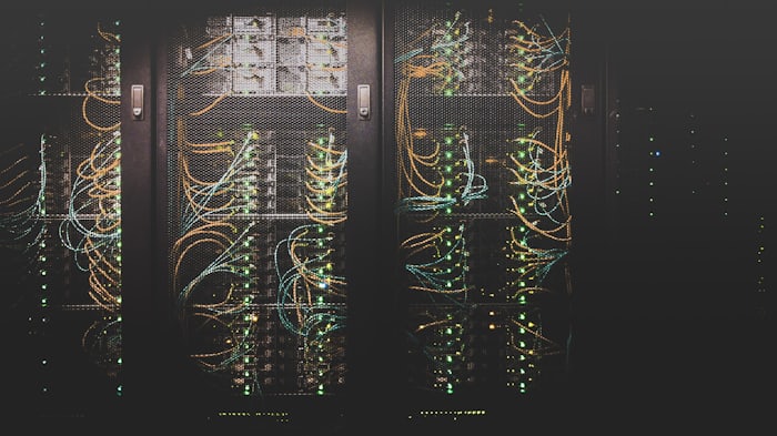 Server racks with green network cables